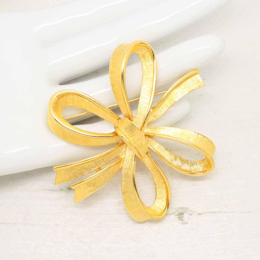 Vintage 1980s Monet Gold Plated Stylised Bow Brooch