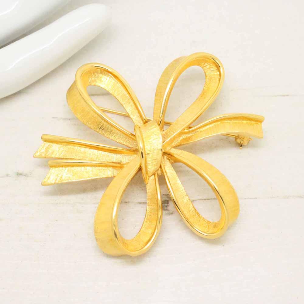 Vintage 1980s Monet Gold Plated Stylised Bow Brooch